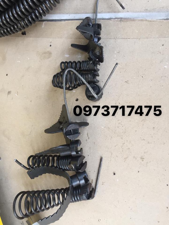 phụ kiện mấy thông cống lò xo